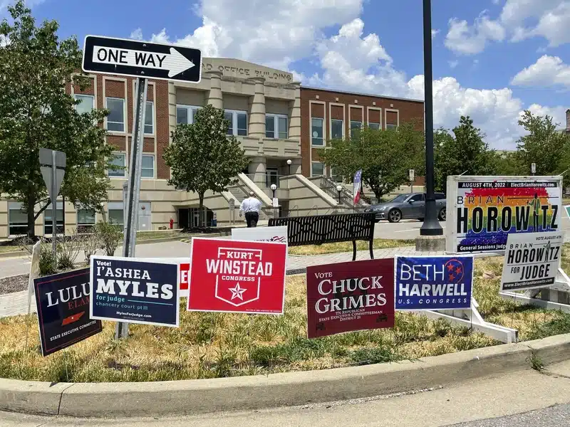 political yard signs encourage voters to take action